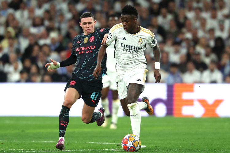 Vini Jr. empata com Messi em assistncias no mata-mata da Champions